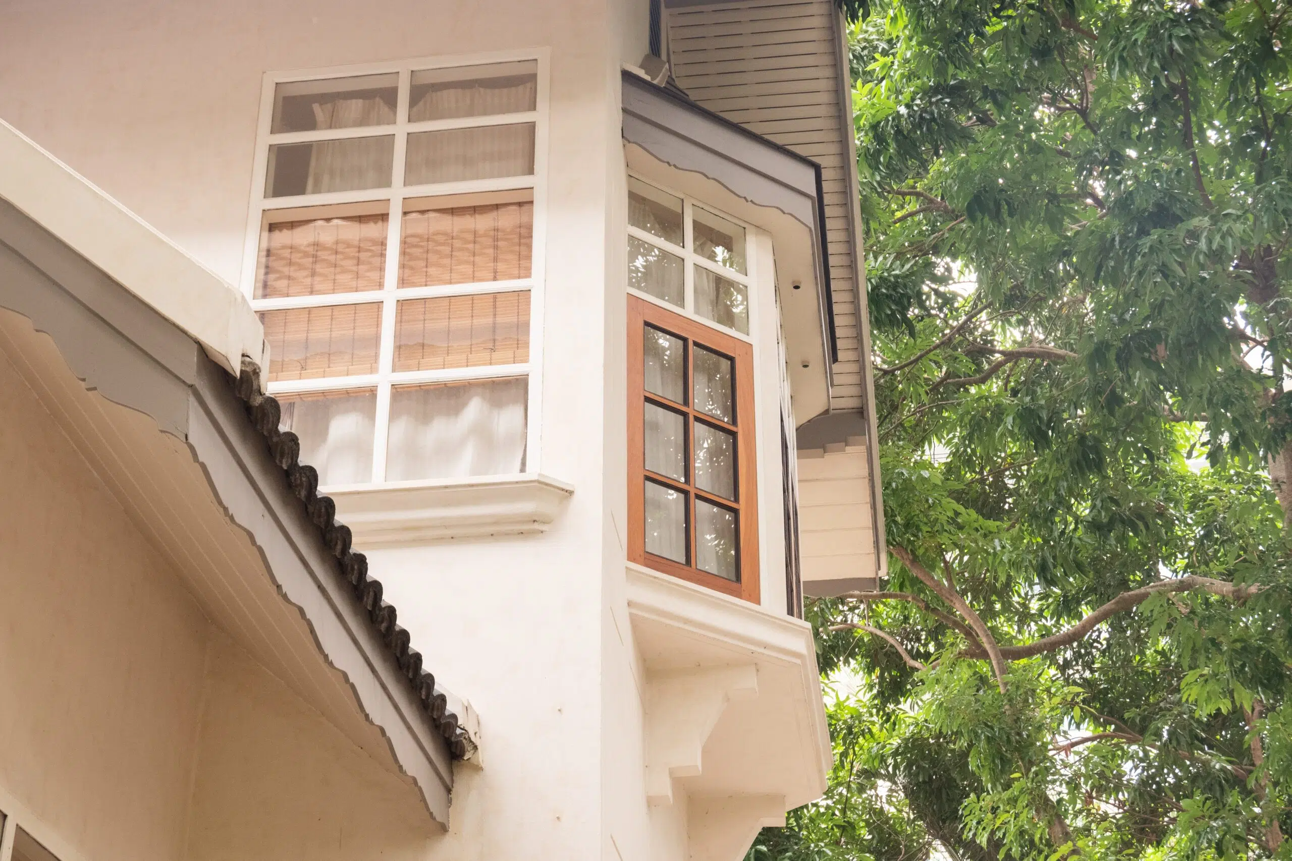 Casement window on the side of a house.